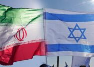Foto: Foto Kolase Bendera Israel dan Iran. (AP Photo)